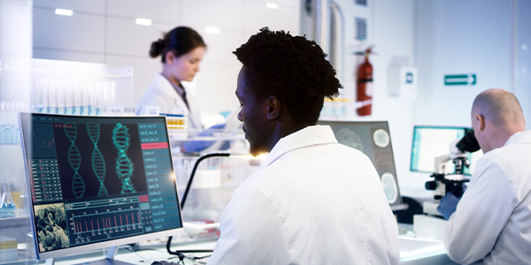 Scientists working in laboratory.