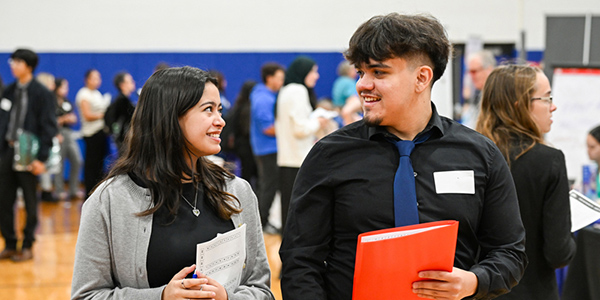 Two students at career fair.