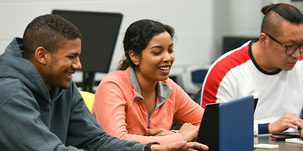 Computer Science students with laptops.