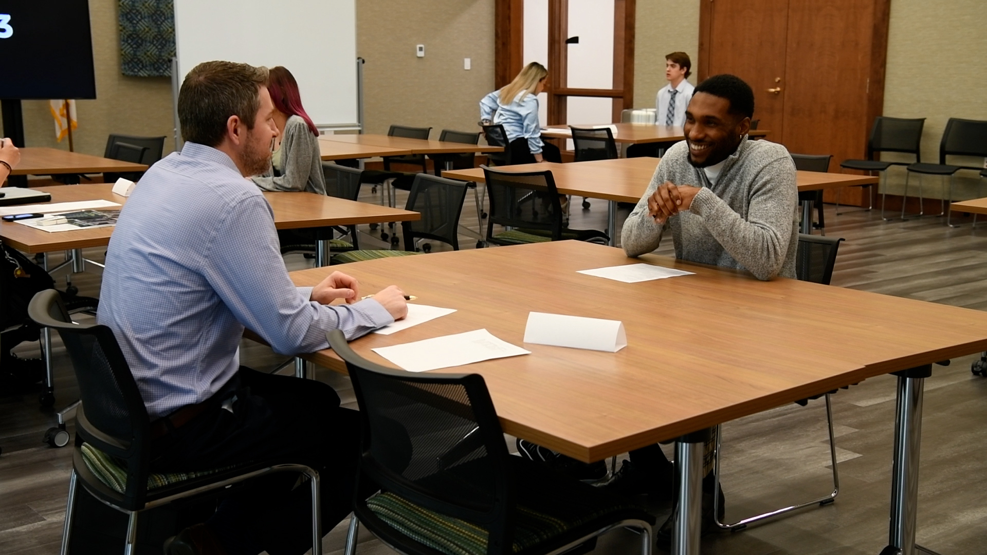 student and employer talking in the McWethy Room